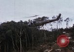 Image of Flying and landing of UH-1H helicopter during Operation Somerset Plain Vietnam, 1968, second 23 stock footage video 65675026846