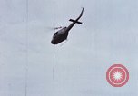 Image of Flying and landing of UH-1H helicopter during Operation Somerset Plain Vietnam, 1968, second 26 stock footage video 65675026846
