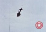 Image of Flying and landing of UH-1H helicopter during Operation Somerset Plain Vietnam, 1968, second 27 stock footage video 65675026846
