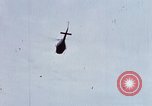 Image of Flying and landing of UH-1H helicopter during Operation Somerset Plain Vietnam, 1968, second 28 stock footage video 65675026846