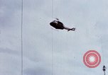 Image of Flying and landing of UH-1H helicopter during Operation Somerset Plain Vietnam, 1968, second 39 stock footage video 65675026846