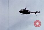 Image of Flying and landing of UH-1H helicopter during Operation Somerset Plain Vietnam, 1968, second 40 stock footage video 65675026846
