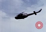 Image of Flying and landing of UH-1H helicopter during Operation Somerset Plain Vietnam, 1968, second 41 stock footage video 65675026846