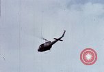 Image of Flying and landing of UH-1H helicopter during Operation Somerset Plain Vietnam, 1968, second 42 stock footage video 65675026846