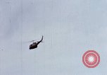 Image of Flying and landing of UH-1H helicopter during Operation Somerset Plain Vietnam, 1968, second 43 stock footage video 65675026846