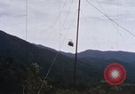 Image of Flying and landing of UH-1H helicopter during Operation Somerset Plain Vietnam, 1968, second 57 stock footage video 65675026846
