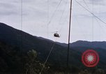 Image of Flying and landing of UH-1H helicopter during Operation Somerset Plain Vietnam, 1968, second 58 stock footage video 65675026846