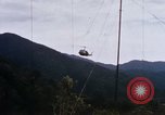Image of Flying and landing of UH-1H helicopter during Operation Somerset Plain Vietnam, 1968, second 59 stock footage video 65675026846