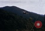 Image of Flying and landing of UH-1H helicopter during Operation Somerset Plain Vietnam, 1968, second 61 stock footage video 65675026846