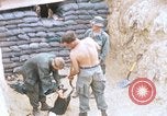Image of US Soldiers filling sandbags during Operation Somerset Plain Vietnam, 1968, second 1 stock footage video 65675026847