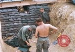 Image of US Soldiers filling sandbags during Operation Somerset Plain Vietnam, 1968, second 3 stock footage video 65675026847