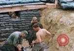 Image of US Soldiers filling sandbags during Operation Somerset Plain Vietnam, 1968, second 6 stock footage video 65675026847
