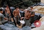 Image of US Soldiers filling sandbags during Operation Somerset Plain Vietnam, 1968, second 52 stock footage video 65675026847