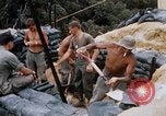 Image of US Soldiers filling sandbags during Operation Somerset Plain Vietnam, 1968, second 54 stock footage video 65675026847