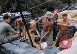 Image of US Soldiers filling sandbags during Operation Somerset Plain Vietnam, 1968, second 62 stock footage video 65675026847