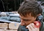 Image of US Soldier speaking on the phone during Operation Somerset Plain Vietnam, 1968, second 35 stock footage video 65675026848
