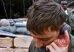 Image of US Soldier speaking on the phone during Operation Somerset Plain Vietnam, 1968, second 39 stock footage video 65675026848