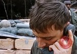 Image of US Soldier speaking on the phone during Operation Somerset Plain Vietnam, 1968, second 40 stock footage video 65675026848