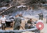 Image of US Soldier speaking on the phone during Operation Somerset Plain Vietnam, 1968, second 44 stock footage video 65675026848