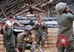 Image of US Soldier speaking on the phone during Operation Somerset Plain Vietnam, 1968, second 49 stock footage video 65675026848