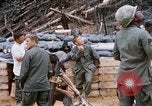 Image of US Soldier speaking on the phone during Operation Somerset Plain Vietnam, 1968, second 50 stock footage video 65675026848