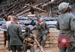 Image of US Soldier speaking on the phone during Operation Somerset Plain Vietnam, 1968, second 52 stock footage video 65675026848