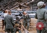 Image of US Soldier speaking on the phone during Operation Somerset Plain Vietnam, 1968, second 53 stock footage video 65675026848