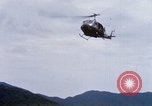 Image of US Soldiers unloading supplies during Operation Somerset Plain Vietnam, 1968, second 27 stock footage video 65675026849