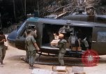 Image of US Soldiers unloading supplies during Operation Somerset Plain Vietnam, 1968, second 46 stock footage video 65675026849