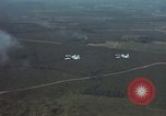 Standbild zwei USAF A-1E Flugzeuge fliegen Bien Hoa Vietnam ab, 1965, aus Sekunde 6 historischem Filmmaterial Videoclip 65675026853