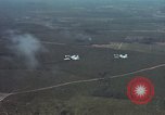 Standbild zwei USAF A-1E Flugzeuge fliegen Bien Hoa Vietnam ab, 1965, aus Sekunde 7 historischem Filmmaterial Videoclip 65675026853