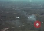 Standbild zwei USAF A-1E Flugzeuge fliegen Bien Hoa Vietnam ab, 1965, aus Sekunde 10 historischem Filmmaterial Videoclip 65675026853