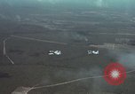 Standbild zwei USAF A-1E Flugzeuge fliegen Bien Hoa Vietnam ab, 1965, aus Sekunde 11 historischem Filmmaterial Videoclip 65675026853