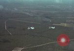 Standbild zwei USAF A-1E Flugzeuge fliegen Bien Hoa Vietnam ab, 1965, aus Sekunde 12 historischem Filmmaterial Videoclip 65675026853