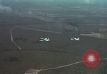 Standbild zwei USAF A-1E Flugzeuge fliegen Bien Hoa Vietnam ab, 1965, aus Sekunde 13 historischem Filmmaterial Videoclip 65675026853