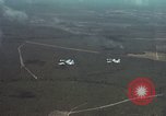 Standbild zwei USAF A-1E Flugzeuge fliegen Bien Hoa Vietnam ab, 1965, aus Sekunde 14 historischem Filmmaterial Videoclip 65675026853