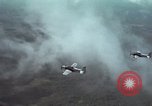 Standbild zwei USAF A-1E Flugzeuge fliegen Bien Hoa Vietnam ab, 1965, aus Sekunde 16 historischem Filmmaterial Videoclip 65675026853