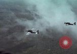 Standbild zwei USAF A-1E Flugzeuge fliegen Bien Hoa Vietnam ab, 1965, aus Sekunde 17 historischem Filmmaterial Videoclip 65675026853