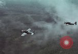 Standbild zwei USAF A-1E Flugzeuge fliegen Bien Hoa Vietnam ab, 1965, aus Sekunde 18 historischem Filmmaterial Videoclip 65675026853