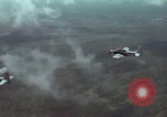 Standbild zwei USAF A-1E Flugzeuge fliegen Bien Hoa Vietnam ab, 1965, aus Sekunde 21 historischem Filmmaterial Videoclip 65675026853