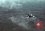 Standbild zwei USAF A-1E Flugzeuge fliegen Bien Hoa Vietnam ab, 1965, aus Sekunde 22 historischem Filmmaterial Videoclip 65675026853