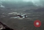 Standbild zwei USAF A-1E Flugzeuge fliegen Bien Hoa Vietnam ab, 1965, aus Sekunde 25 historischem Filmmaterial Videoclip 65675026853