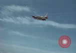 Standbild zwei USAF A-1E Flugzeuge fliegen Bien Hoa Vietnam ab, 1965, aus Sekunde 59 historischem Filmmaterial Videoclip 65675026853