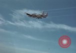 Standbild zwei USAF A-1E Flugzeuge fliegen Bien Hoa Vietnam ab, 1965, aus Sekunde 62 historischem Filmmaterial Videoclip 65675026853