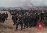 Image of Soldiers landing at Camp Evans from UH-1D helicopter A Shau Valley Vietnam, 1968, second 13 stock footage video 65675026856