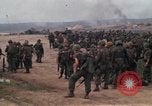 Image of Soldiers landing at Camp Evans from UH-1D helicopter A Shau Valley Vietnam, 1968, second 14 stock footage video 65675026856