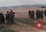 Image of Soldiers landing at Camp Evans from UH-1D helicopter A Shau Valley Vietnam, 1968, second 19 stock footage video 65675026856