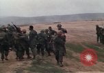 Image of Soldiers landing at Camp Evans from UH-1D helicopter A Shau Valley Vietnam, 1968, second 21 stock footage video 65675026856