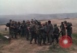 Image of Soldiers landing at Camp Evans from UH-1D helicopter A Shau Valley Vietnam, 1968, second 23 stock footage video 65675026856