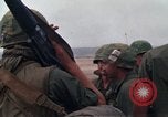 Image of Soldiers landing at Camp Evans from UH-1D helicopter A Shau Valley Vietnam, 1968, second 26 stock footage video 65675026856